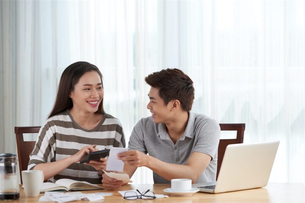 Image of a couple discussing their housing loan in Singapore