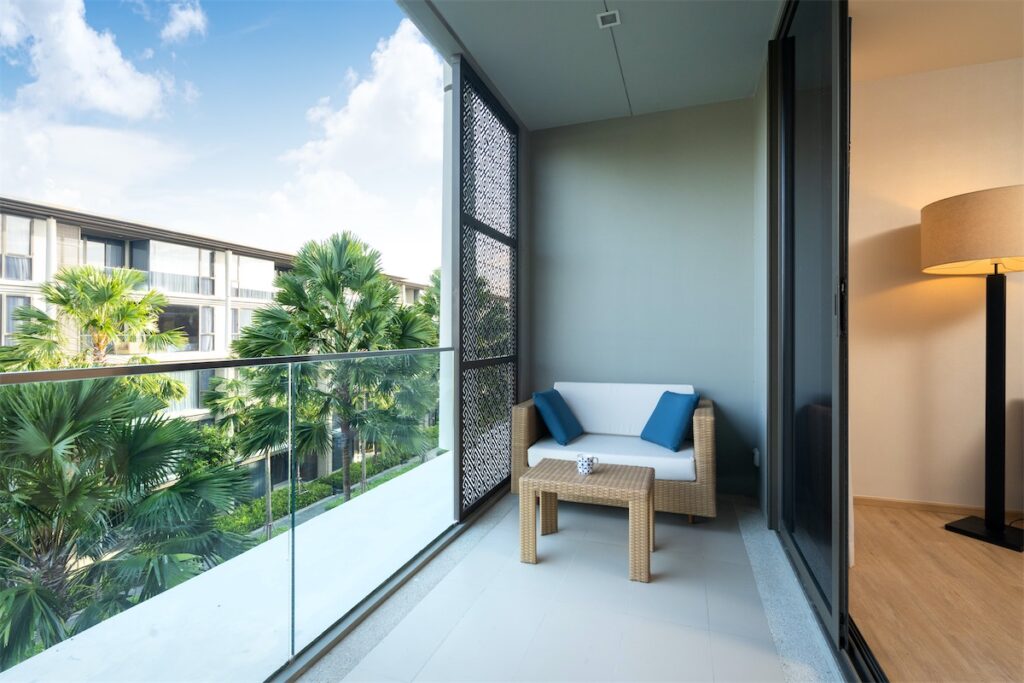 Balcony view of an executive condo in Singapore – which can be pretty affordable with all the available schemes and the right financial decisions.