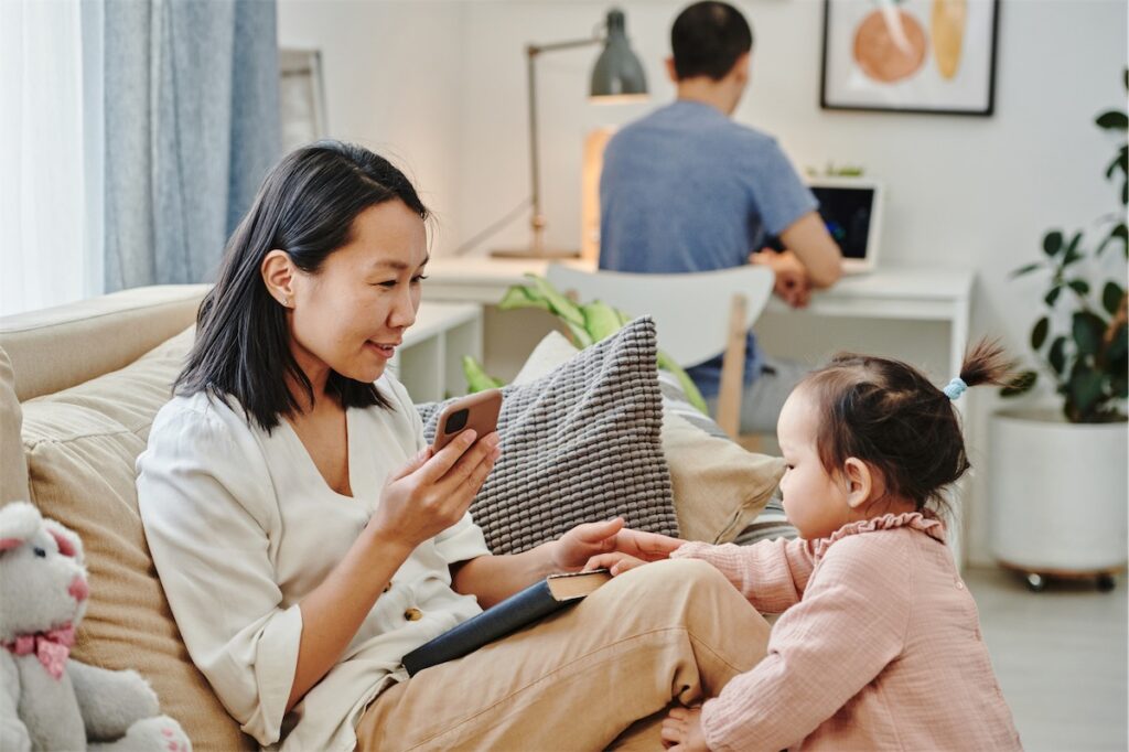 Woman and her family enjoying greater interest savings after refinancing their home loan