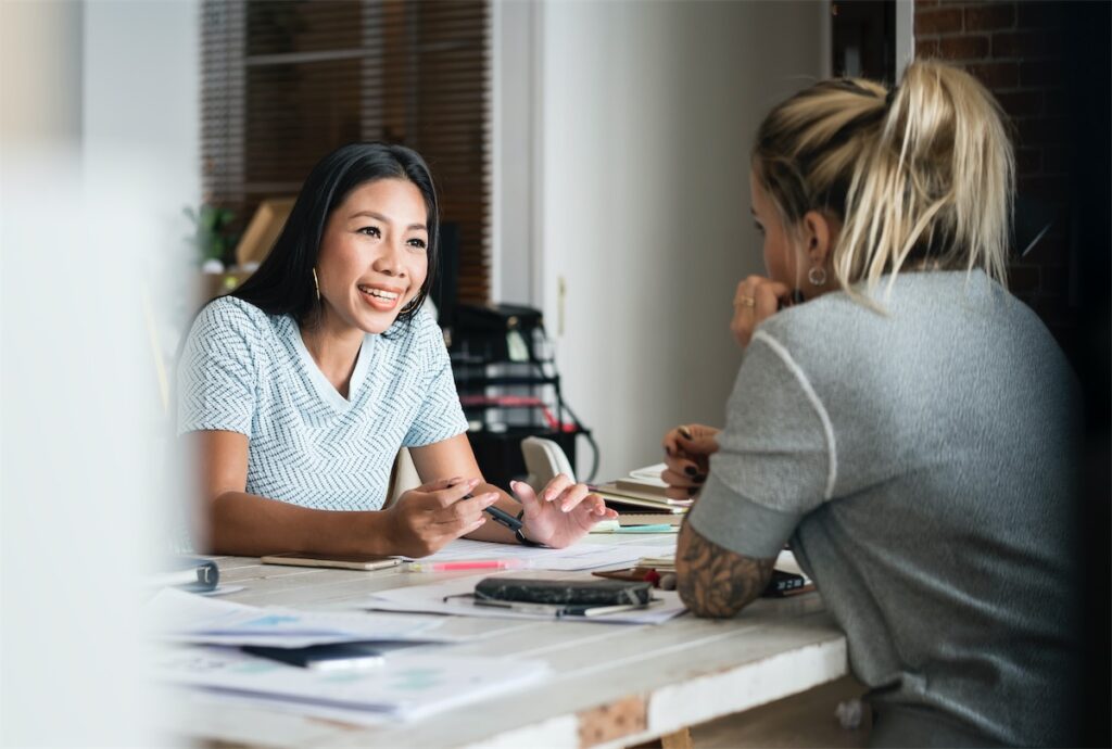 Home loan advisor advising a foreigner on her property purchase in Singapore